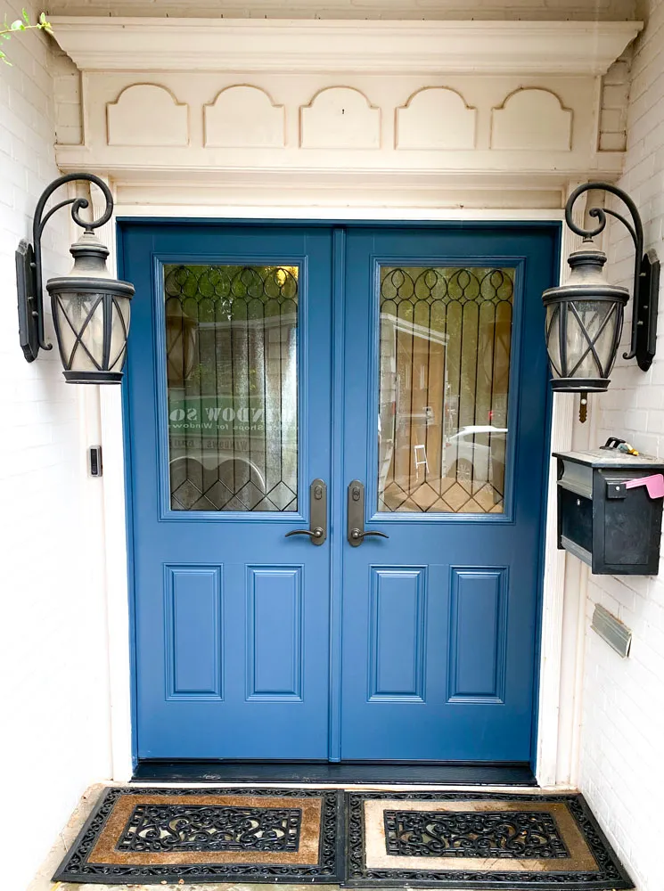 New blue double front doors with decorative glass