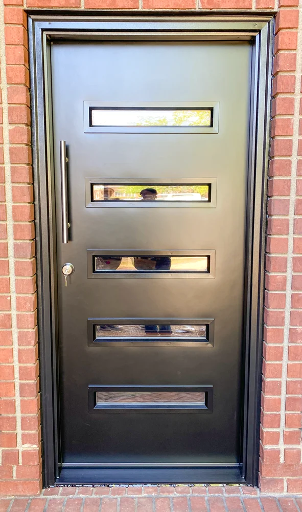 Modern black front door with narrow glass lites