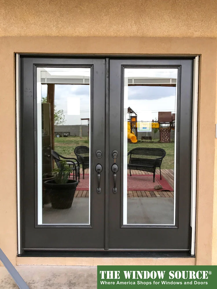 Black double entry doors with full glass panels