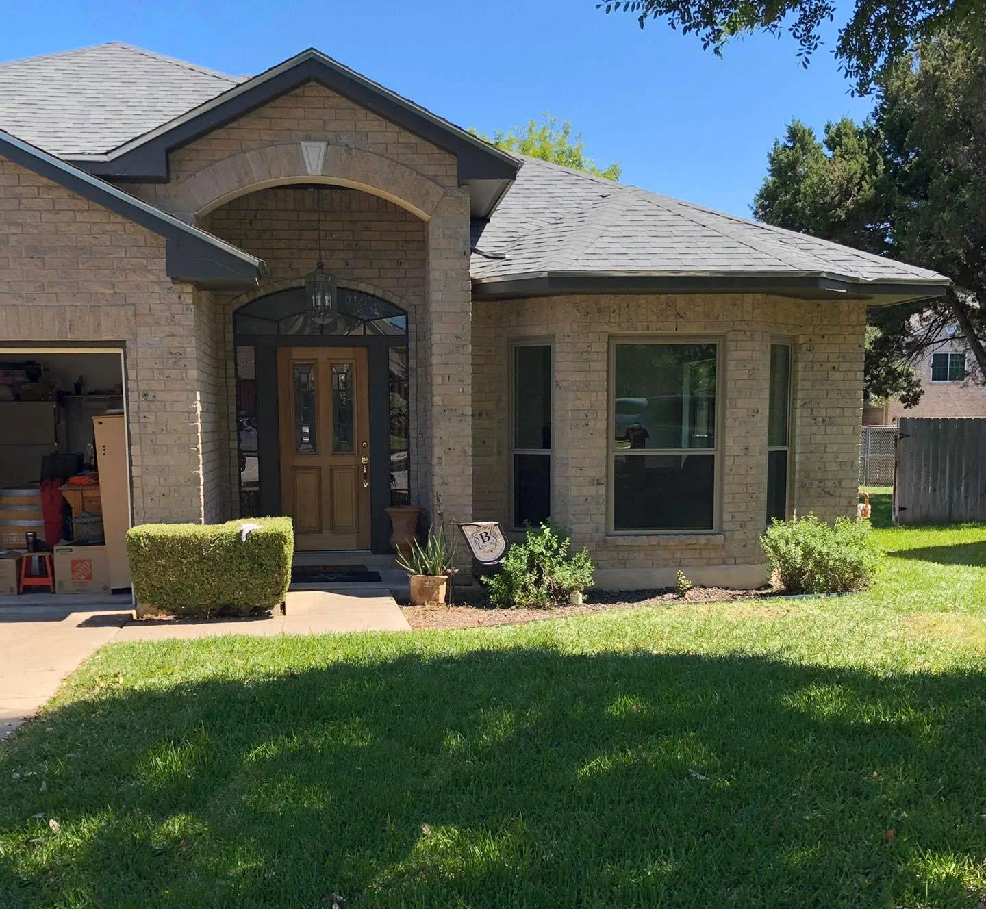 Single-story brick home with a replacement bay window