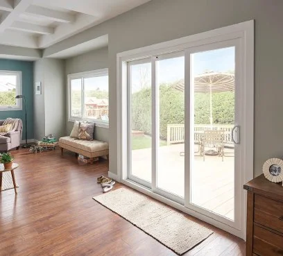 Living room with wood floors and a large sliding patio door