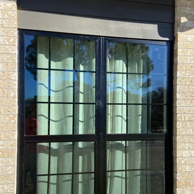 New energy-efficient double-pane vinyl window installed in a Houston home by Window Source Houston, showcasing clean lines and draft-free sealing.